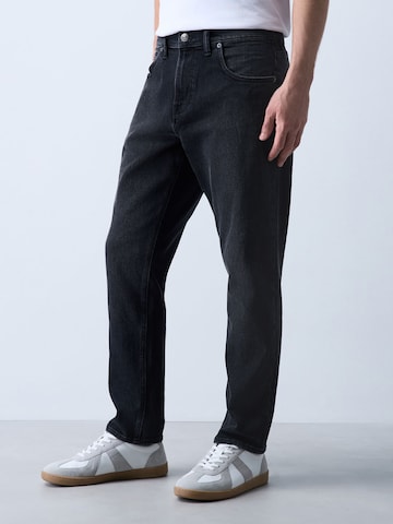 Next - Slimfit Vaquero en negro: frente