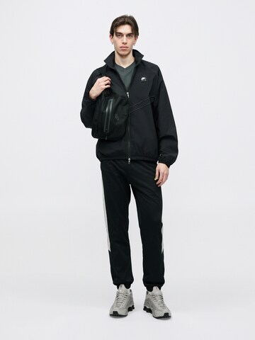 Veste mi-saison 'AIR' Nike Sportswear en noir