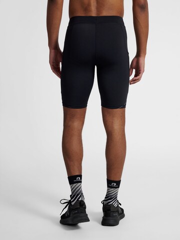 Skinny Pantalon de sport 'Race' Newline en noir