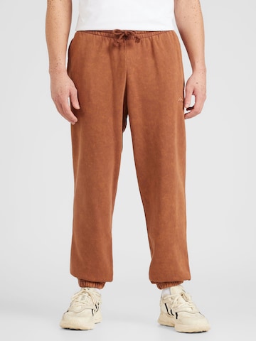 Effilé Pantalon de sport ADIDAS SPORTSWEAR en marron : devant