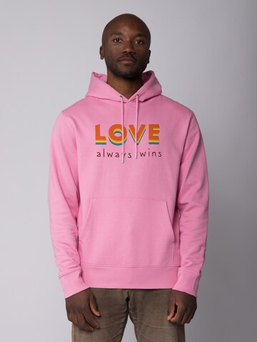 Watapparel Sweatshirt 'Love always wins' in Roze: voorkant