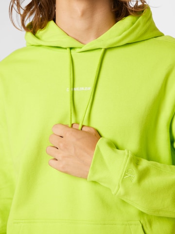 Sweat-shirt Calvin Klein Jeans en vert