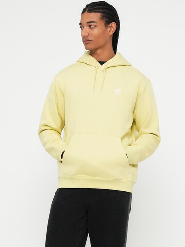 ADIDAS ORIGINALSSweater majica 'ESS' - žuta boja