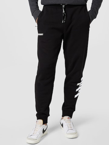 Tapered Pantaloni sport 'Train Core' de la Superdry pe negru: față