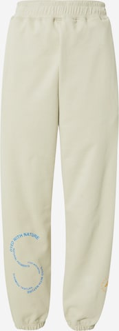 ADIDAS BY STELLA MCCARTNEY Tapered Workout Pants in Yellow: front
