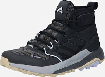 ADIDAS PERFORMANCE Boots in Black: front