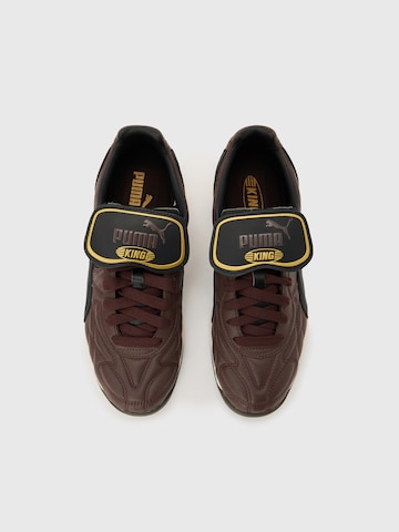 PUMA Низкие кроссовки 'King' в Коричневый
