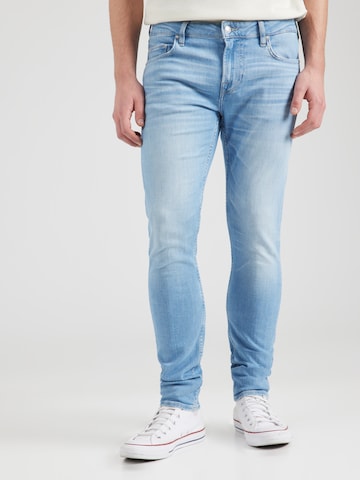 GUESS Slimfit Jeansy 'CHRIS' w kolorze niebieski: przód