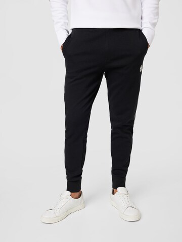Michael Kors Tapered Trousers in Black: front