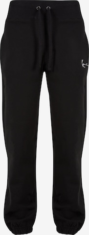 Karl Kani Tapered Pants in Black: front