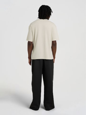 T-Shirt 'Auf Dem Geld' AND1 en gris