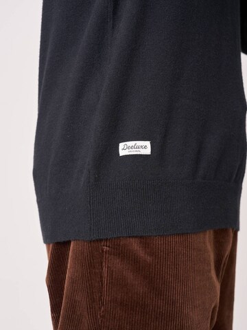 Deeluxe Pullover‌‌‌‌‌‌ in Schwarz
