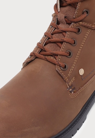 s.Oliver - Botas con cordones en marrón: frente