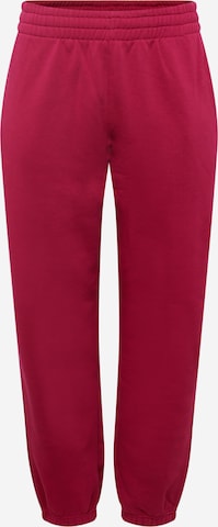 ADIDAS ORIGINALS Zwężany krój Spodnie 'Adicolor Essentials ' w kolorze czerwony: przód