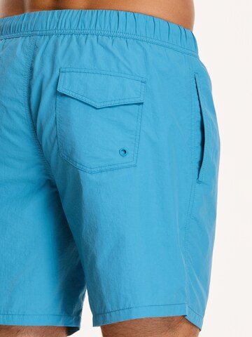 Shiwi Kratke kopalne hlače 'NICK' | modra barva