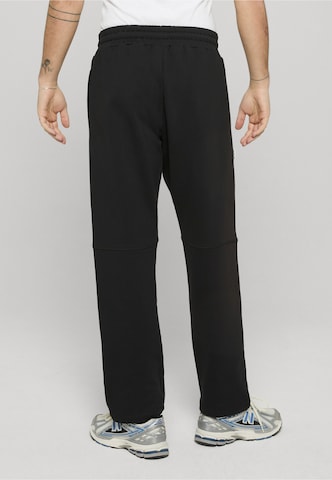 Loosefit Pantaloni di Unfair Athletics in nero