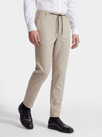 Coupe slim Pantalon Thomas Goodwin en beige : devant