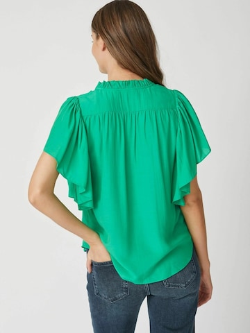 Maglietta di co'couture in verde