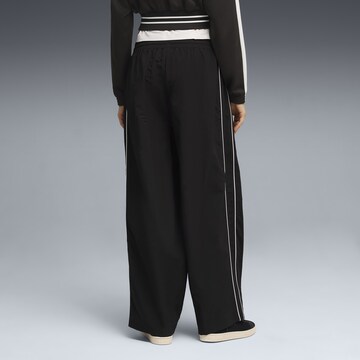 PUMA Regular Sportbroek 'T7' in Zwart