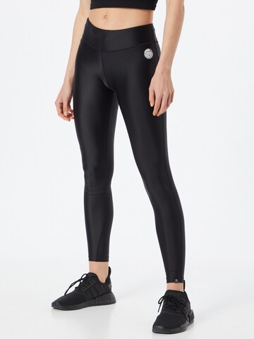 RIP CURL Skinny Workout Pants in Black: front