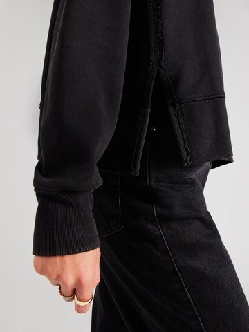 GUESS Originals Sweatshirt in Zwart