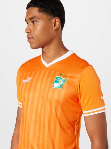 PUMA - Camiseta de fútbol en naranja