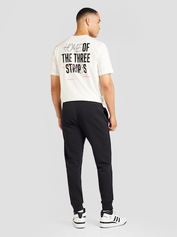 ADIDAS SPORTSWEAR Trainingsanzug in Schwarz