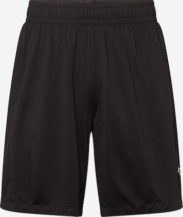 PUMA - Regular Calças de desporto em preto: frente