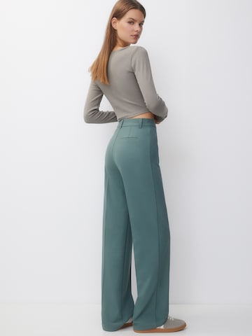 Pull&Bear Zvonové kalhoty Kalhoty s puky – zelená