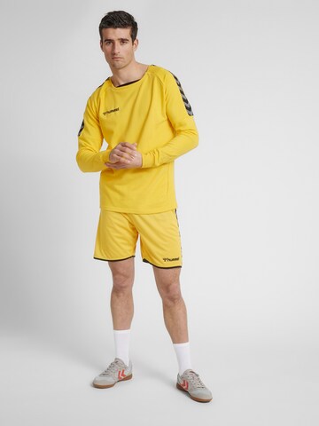 regular Pantaloni sportivi 'Poly' di Hummel in giallo