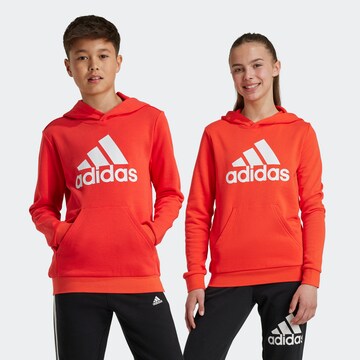 ADIDAS ORIGINALS Sports sweatshirt 'Essentials' in Orange: front