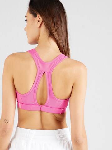 NIKE Bustier Urheilurintaliivit 'SWOOSH' värissä vaaleanpunainen