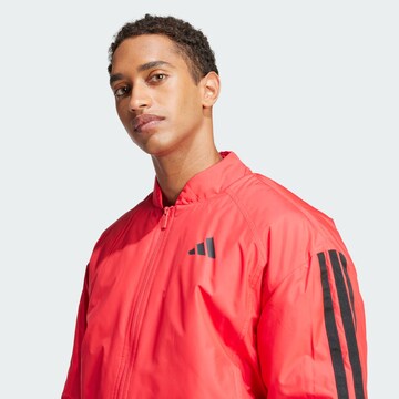 ADIDAS SPORTSWEAR Sports jacket 'Essentials' in Red