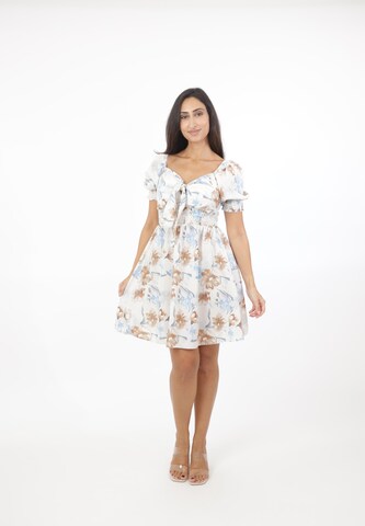 Elara Kjole i beige: forside