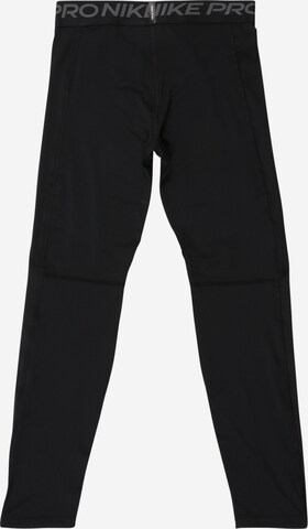 Skinny Pantaloni sportivi di NIKE in nero