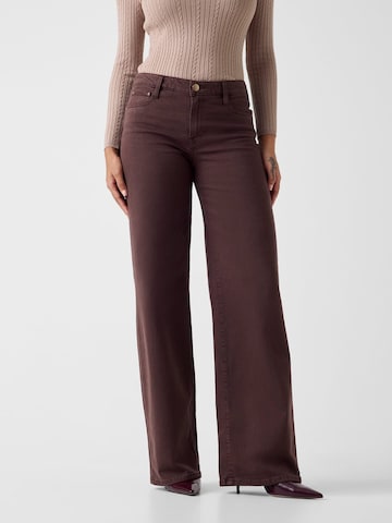 GUESS Wide leg Jeans in Brown: front