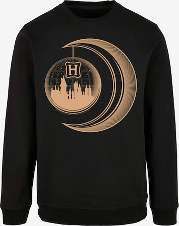 F4NT4STIC Sweatshirt 'Harry Potter Hogwarts Moon' in Zwart: voorkant
