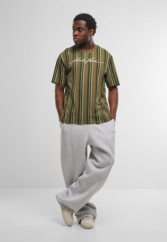 Wide leg Pantaloni di Karl Kani in grigio