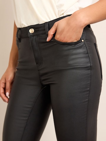 Skinny Jeans di Next in nero