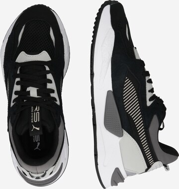 Sneaker bassa 'Reinvention' di PUMA in nero