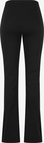 évasé Pantalon Karl Kani en noir