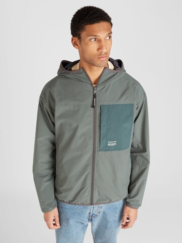 Revolution Between-season jacket in Green: front