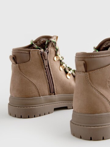 Bottes Next en beige