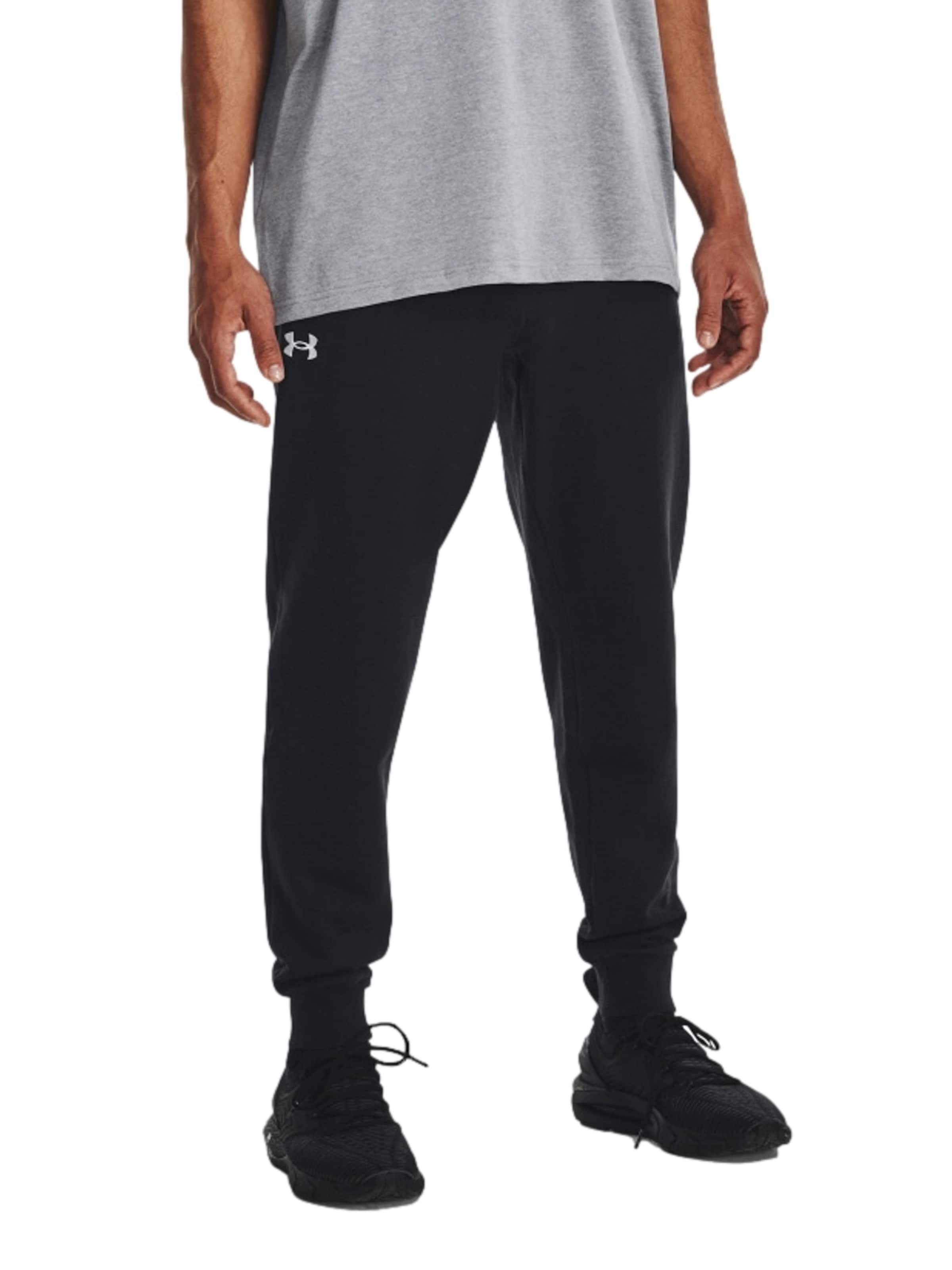 Loosefit Pantalon de sport 'Rival' UNDER ARMOUR en noir : devant