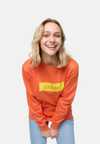smiler. Sweatshirt in Oranje
