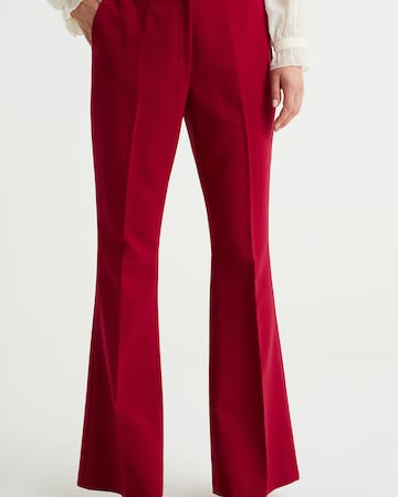 WE Fashion Flared Trousers with creases in Red