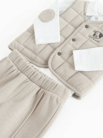 Set di Cool Club in beige