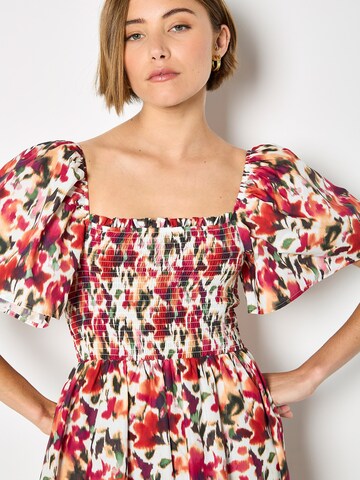 Robe Apricot en mélange de couleurs