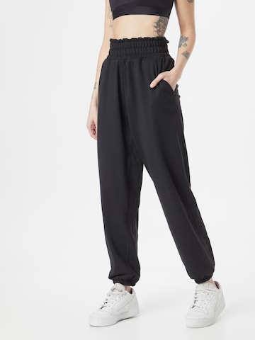 ADIDAS PERFORMANCE Tapered Workout Pants 'Studio' in Black: front