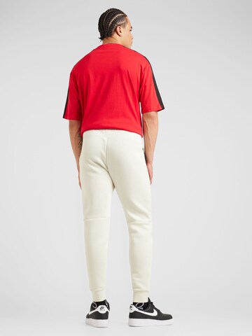 Nike Sportswear Tapered Trousers 'TECH FLEECE' in Green